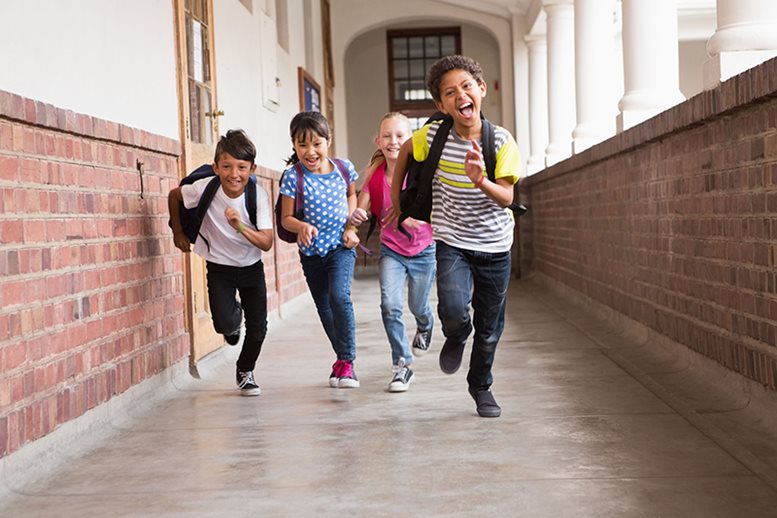 Kids with wristbands going on a field trip